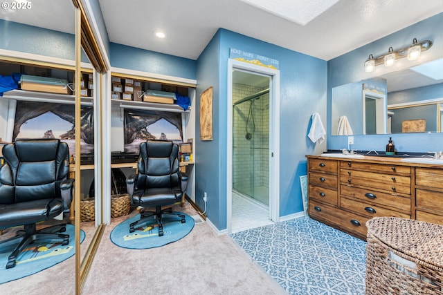 bathroom featuring vanity and a shower with shower door