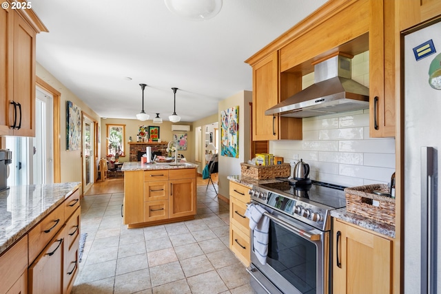 4315 High St, Eugene, OR 97405 - kitchen featuring wall chimney exhaust hood, stainless steel appliances, tasteful backsplash, a kitchen island, and light stone counters