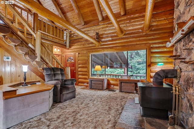 living room featuring stairs, high vaulted ceiling, beamed ceiling, and wooden ceiling