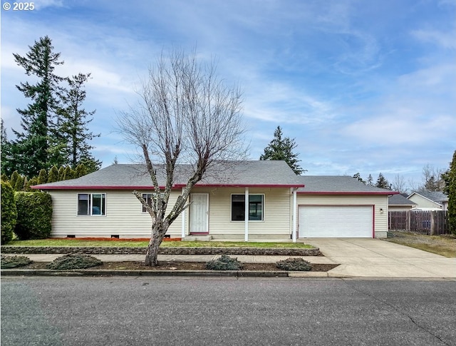 ranch-style home with a garage, concrete driveway, and crawl space