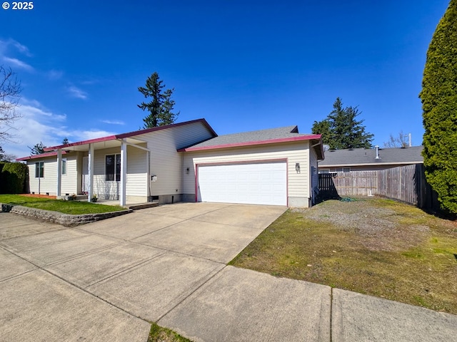 single story home featuring driveway, an attached garage, and fence