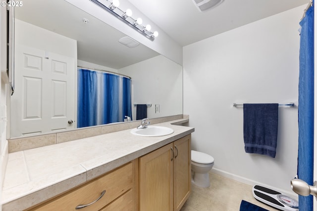 15416 SW Mallard Dr Unit 102, Beaverton, OR 97007 - bathroom featuring vanity, toilet, baseboards, and a shower with shower curtain