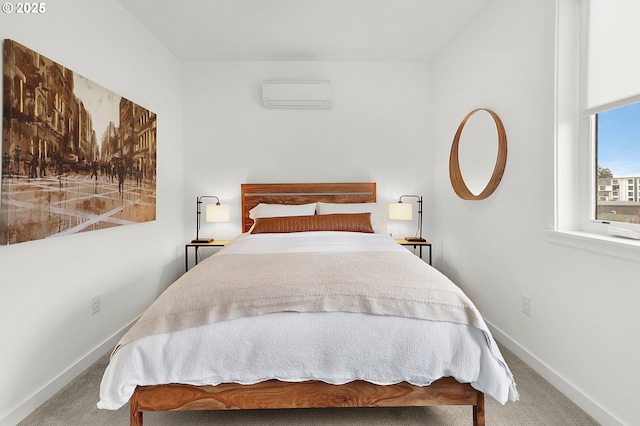 carpeted bedroom featuring an AC wall unit