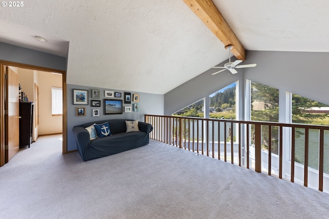 33645 Resort Dr, Pacific City, OR 97135 - carpeted living room with a ceiling fan, plenty of natural light, and a textured ceiling