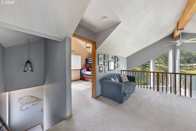 33645 Resort Dr, Pacific City, OR 97135 - living room with a textured ceiling, ceiling fan, carpet, and healthy amount of natural light