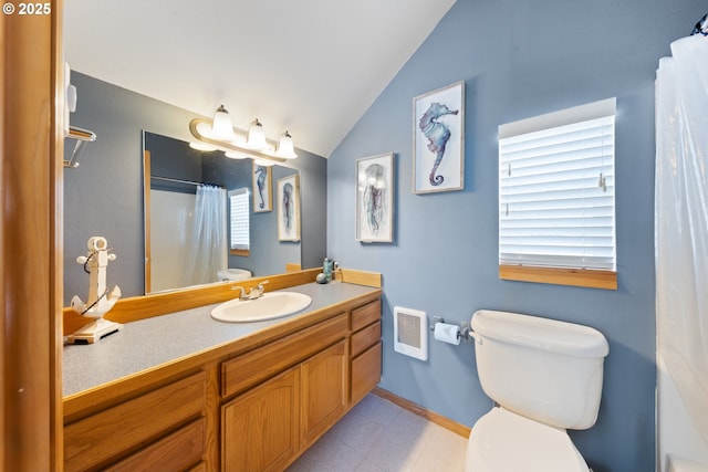 33645 Resort Dr, Pacific City, OR 97135 - full bathroom featuring vaulted ceiling, vanity, and a shower with shower curtain