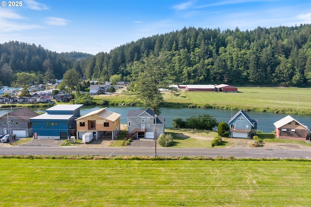 33645 Resort Dr, Pacific City, OR 97135 - bird's eye view of a heavily wooded area and a large body of water