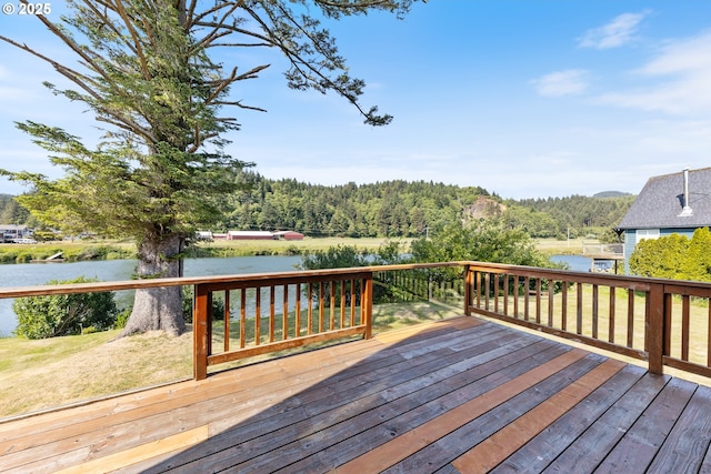 33645 Resort Dr, Pacific City, OR 97135 - deck with a water view and a view of trees