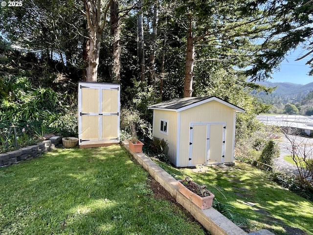 view of shed with a mountain view