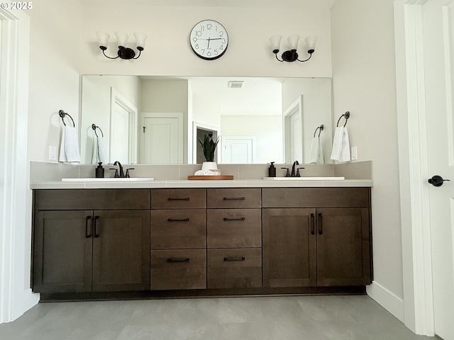 8015 NE 172nd Ave, Vancouver, WA 98682 - bathroom featuring double vanity and concrete flooring