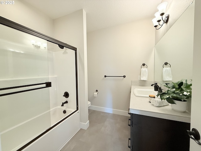 8015 NE 172nd Ave, Vancouver, WA 98682 - full bathroom with vanity, toilet, baseboards, bath / shower combo with glass door, and finished concrete flooring