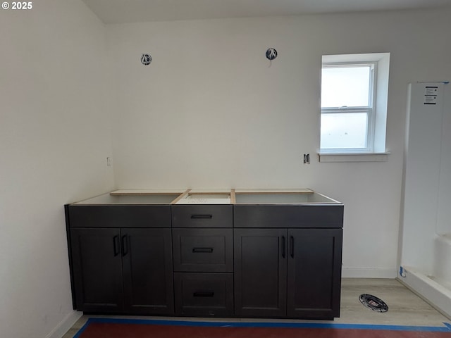 407 SE Shetterly Dr, Dallas, OR 97338 - bathroom featuring baseboards and wood finished floors