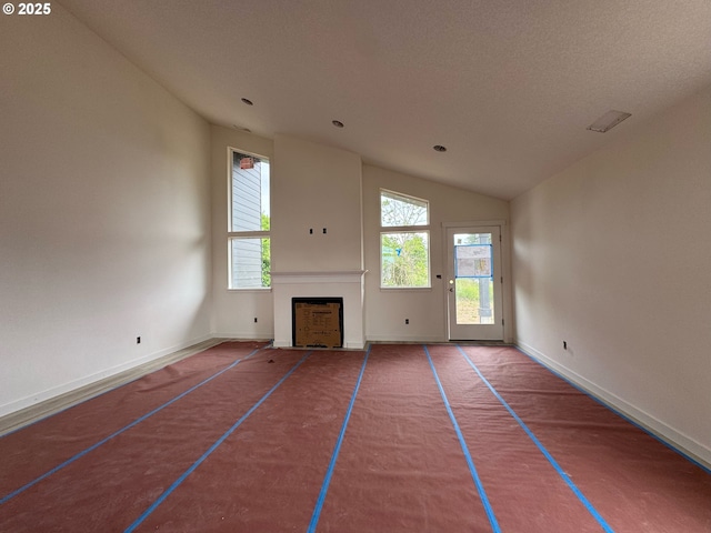 407 SE Shetterly Dr, Dallas, OR 97338 - unfurnished living room with a fireplace and vaulted ceiling