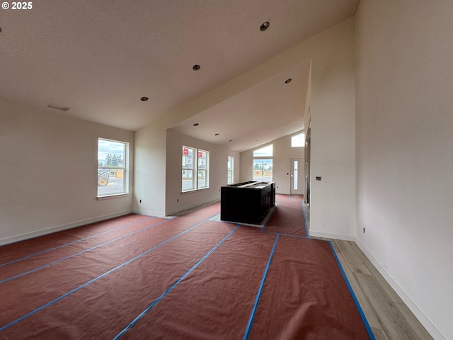 407 SE Shetterly Dr, Dallas, OR 97338 - living room featuring vaulted ceiling and wood finished floors