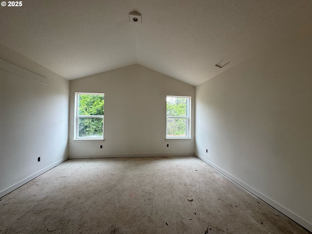 407 SE Shetterly Dr, Dallas, OR 97338 - spare room with healthy amount of natural light and vaulted ceiling
