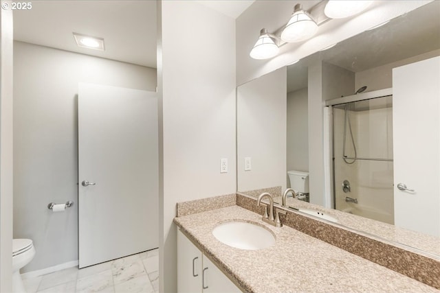 10800 SE 17th Cir Unit Q178, Vancouver, WA 98664 - bathroom featuring toilet, marble look tile flooring, vanity, baseboards, and tub / shower combination
