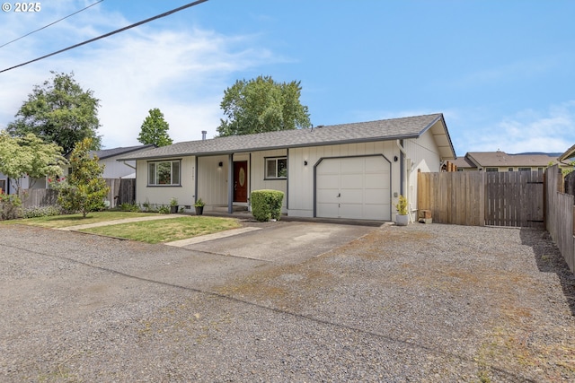 91161 N Miller St, Eugene, OR 97408 - ranch-style house featuring driveway and an attached garage
