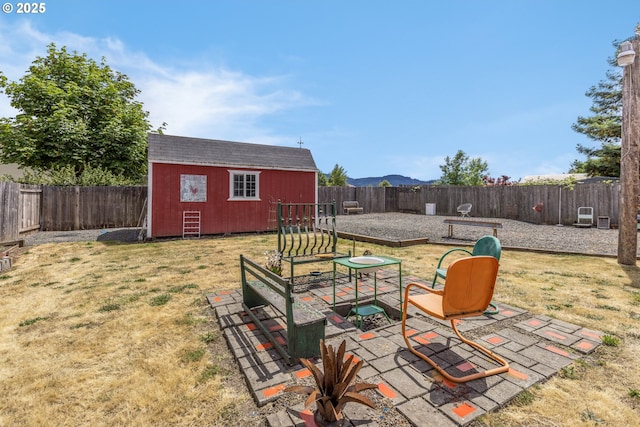 91161 N Miller St, Eugene, OR 97408 - fenced backyard featuring an outdoor structure and a patio area