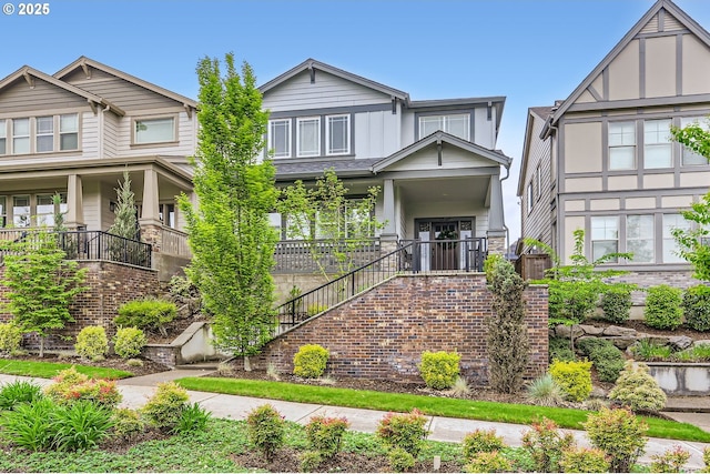 12967 SW River Terrace Blvd, Beaverton, OR 97007 - craftsman-style home with board and batten siding, stairway, and covered porch