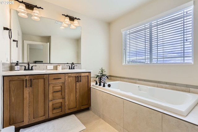 12967 SW River Terrace Blvd, Beaverton, OR 97007 - full bathroom featuring a garden tub, double vanity, and tile patterned flooring