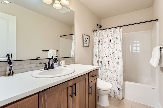 12967 SW River Terrace Blvd, Beaverton, OR 97007 - full bath with toilet, backsplash, vanity, tile patterned floors, and shower / bathtub combination with curtain
