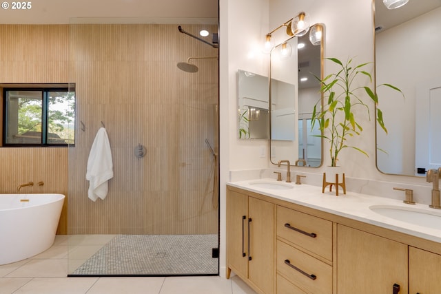 bathroom with shower with separate bathtub, tile patterned flooring, and vanity