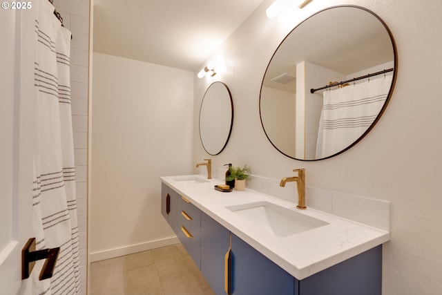 bathroom featuring vanity and tile patterned flooring