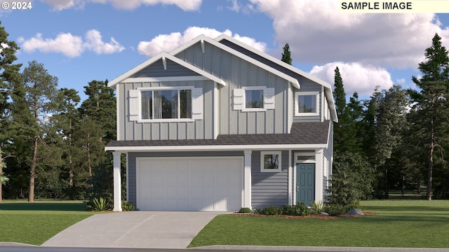 view of front of house featuring a garage and a front yard