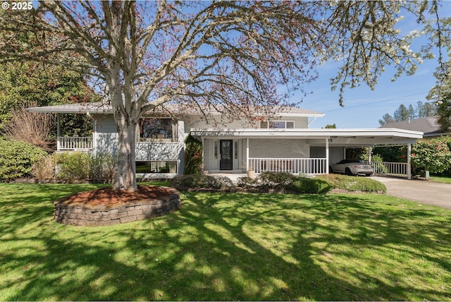 185 W Oriole Dr, Roseburg, OR 97471 - view of front of property with a front lawn, covered porch, an attached carport, and driveway