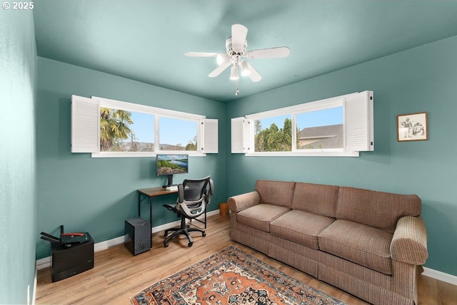 185 W Oriole Dr, Roseburg, OR 97471 - home office featuring wood finished floors, baseboards, and a ceiling fan