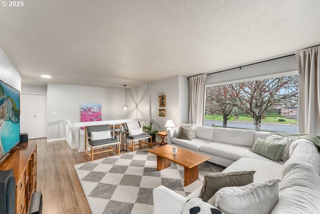 185 W Oriole Dr, Roseburg, OR 97471 - living area with a textured ceiling, recessed lighting, and hardwood / wood-style flooring