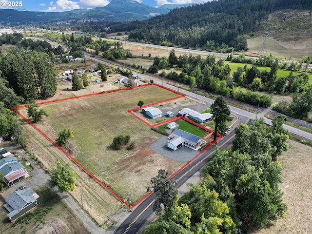 31395 Kenady Ln, Cottage Grove, OR 97424 - overview of rural landscape with property boundaries highlighted, mountains, and a forest