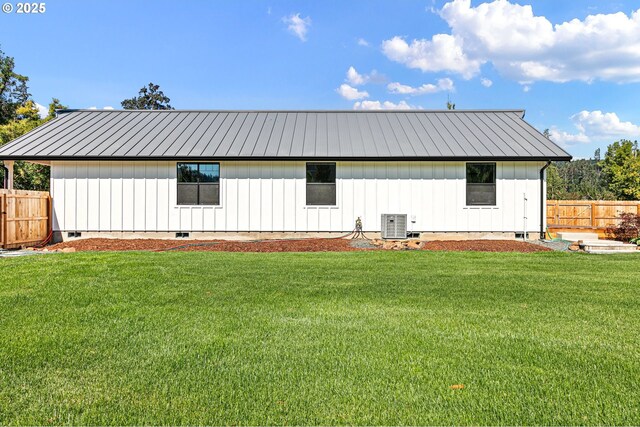 31395 Kenady Ln, Cottage Grove, OR 97424 - back of house with crawl space, metal roof, central AC, and board and batten siding