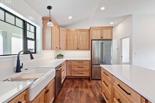 31395 Kenady Ln, Cottage Grove, OR 97424 - kitchen featuring stainless steel appliances, light brown cabinetry, a sink, dark wood-style floors, and vaulted ceiling