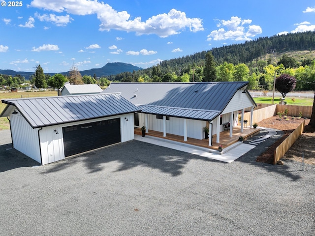 31395 Kenady Ln, Cottage Grove, OR 97424 - modern farmhouse style home with a standing seam roof, a mountain view, and metal roof