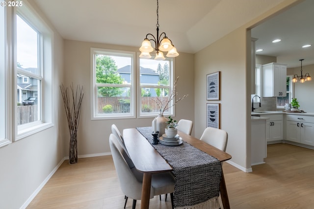 10134 SE 54th Ct, Milwaukie, OR 97222 - dining room with a chandelier, light wood-style flooring, baseboards, and recessed lighting