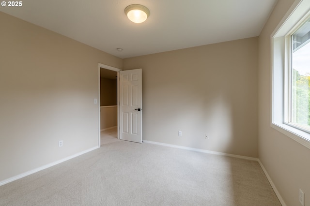 10134 SE 54th Ct, Milwaukie, OR 97222 - unfurnished room with baseboards and light colored carpet