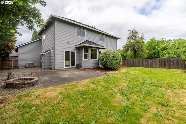 10134 SE 54th Ct, Milwaukie, OR 97222 - rear view of property featuring a fire pit, a patio, and central air condition unit