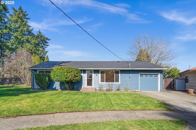 ranch-style house with aphalt driveway, an attached garage, a front yard, entry steps, and fence