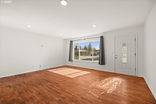 entryway featuring recessed lighting, baseboards, and wood finished floors