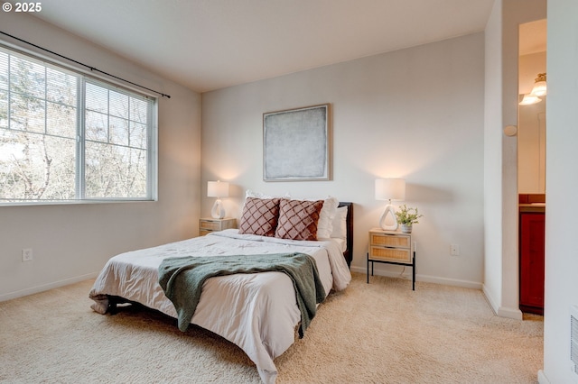 695 NW Falling Waters Ln Unit 304, Portland, OR 97229 - bedroom with carpet and baseboards