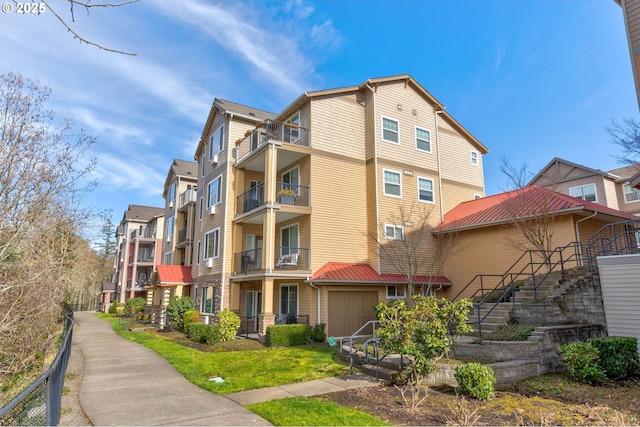 695 NW Falling Waters Ln Unit 304, Portland, OR 97229 - back of house featuring stairs