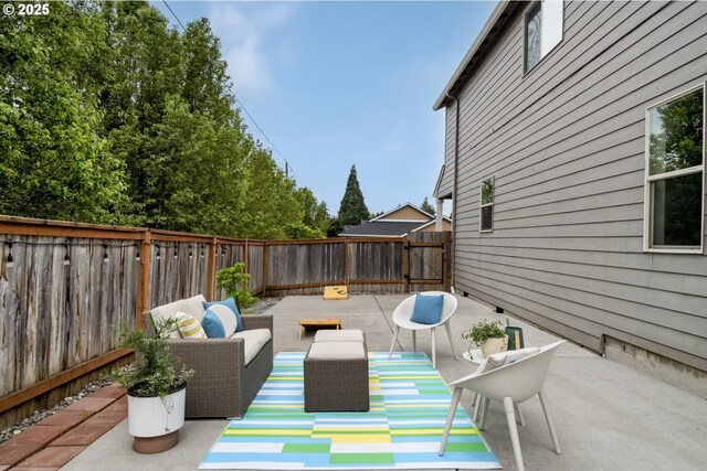 view of patio / terrace featuring a fenced backyard and outdoor lounge area