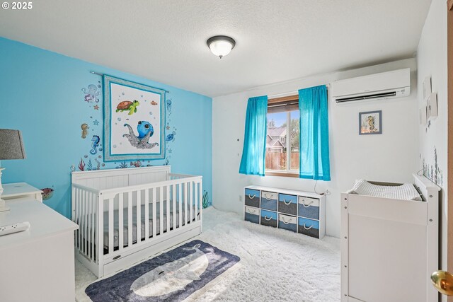 2812 NE Delancey Ct, Vancouver, WA 98682 - carpeted bedroom with an AC wall unit, a textured ceiling, and a nursery area