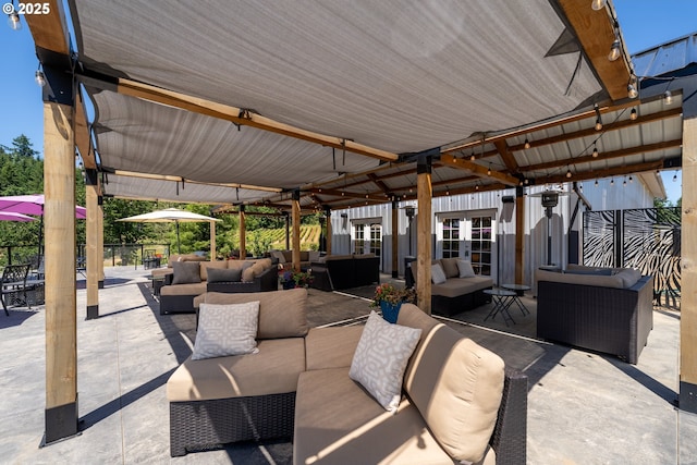 view of patio with french doors and an outdoor living space
