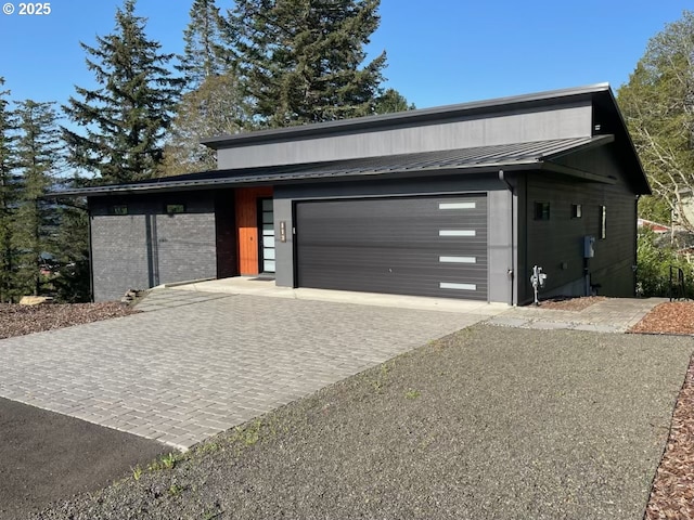 113 NW Willard St, Stevenson, WA 98648 - garage with decorative driveway