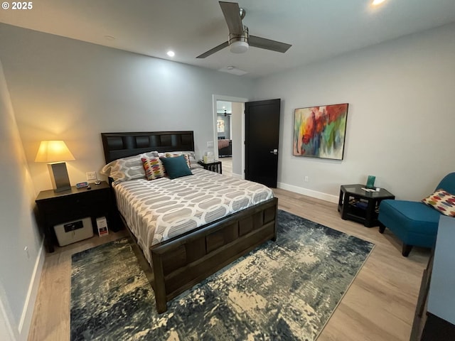 bedroom featuring baseboards, recessed lighting, light wood-style flooring, and a ceiling fan