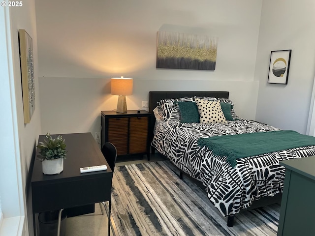bedroom with wood finished floors