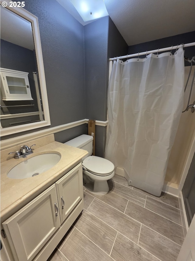 15503 NE 84th St, Vancouver, WA 98682 - bathroom with vanity, toilet, and curtained shower