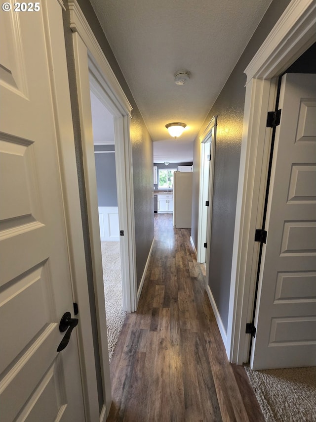 15503 NE 84th St, Vancouver, WA 98682 - hallway with dark wood-style floors and baseboards